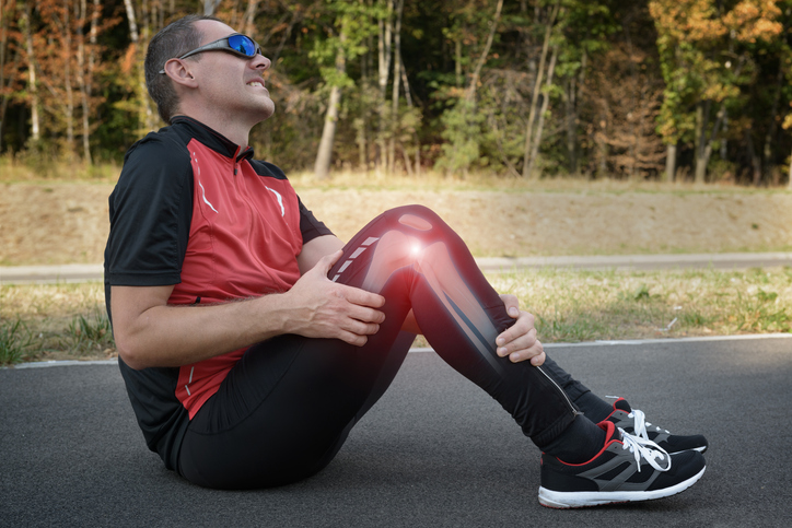 Runner knee injury and pain with leg bones visible